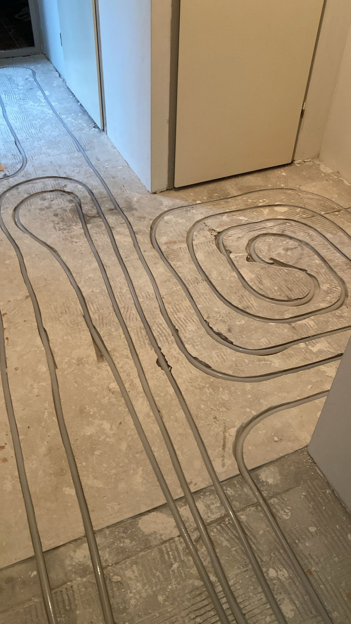 Vloerverwarming aanleg bestaande vloer spiraal